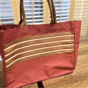 Pink, gold and white striped tote in excellent condition